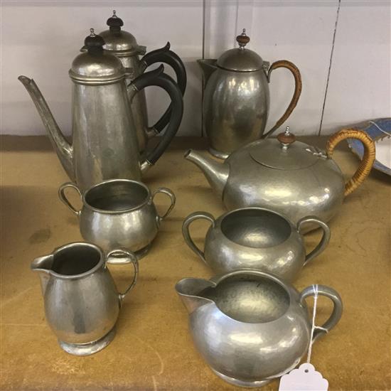 Hammered pewter Liberty & Co 4 piece tea set, mark 01455 with a similar 4 piece coffee set, mark 01396
